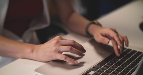 case study business finland - hands computer 500 x 263