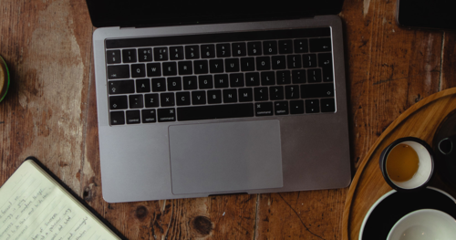 case study palmia - computer on desk 500 x 263